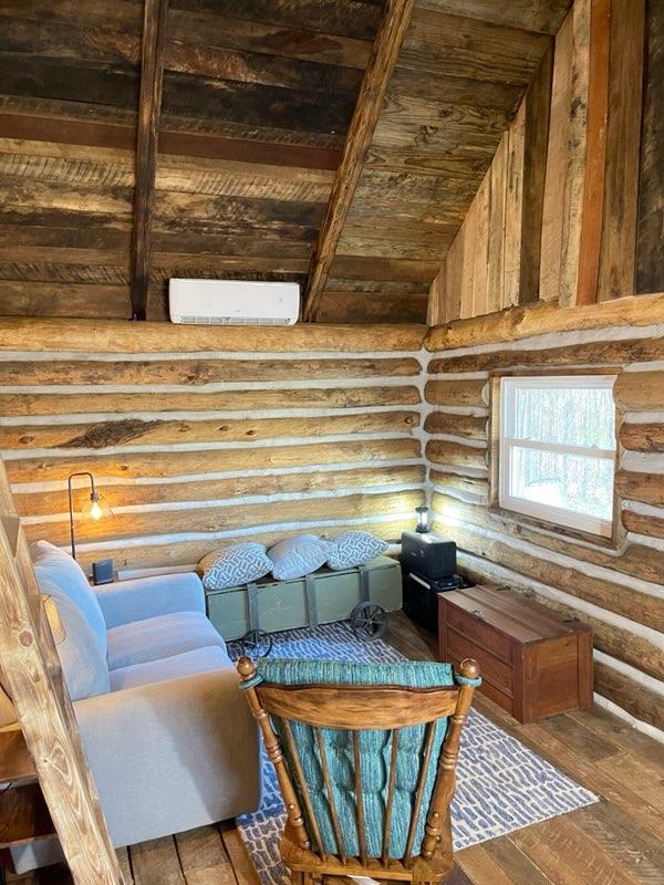 Another part of the living room with natural lighting.